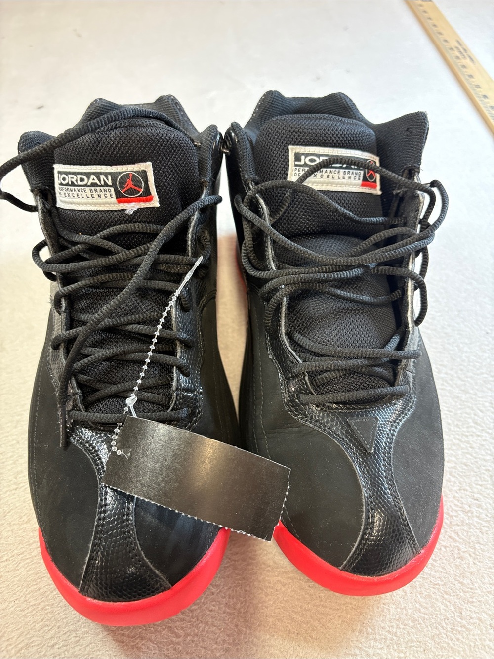 Jordan Men’s Black with Red Accented Sneakers